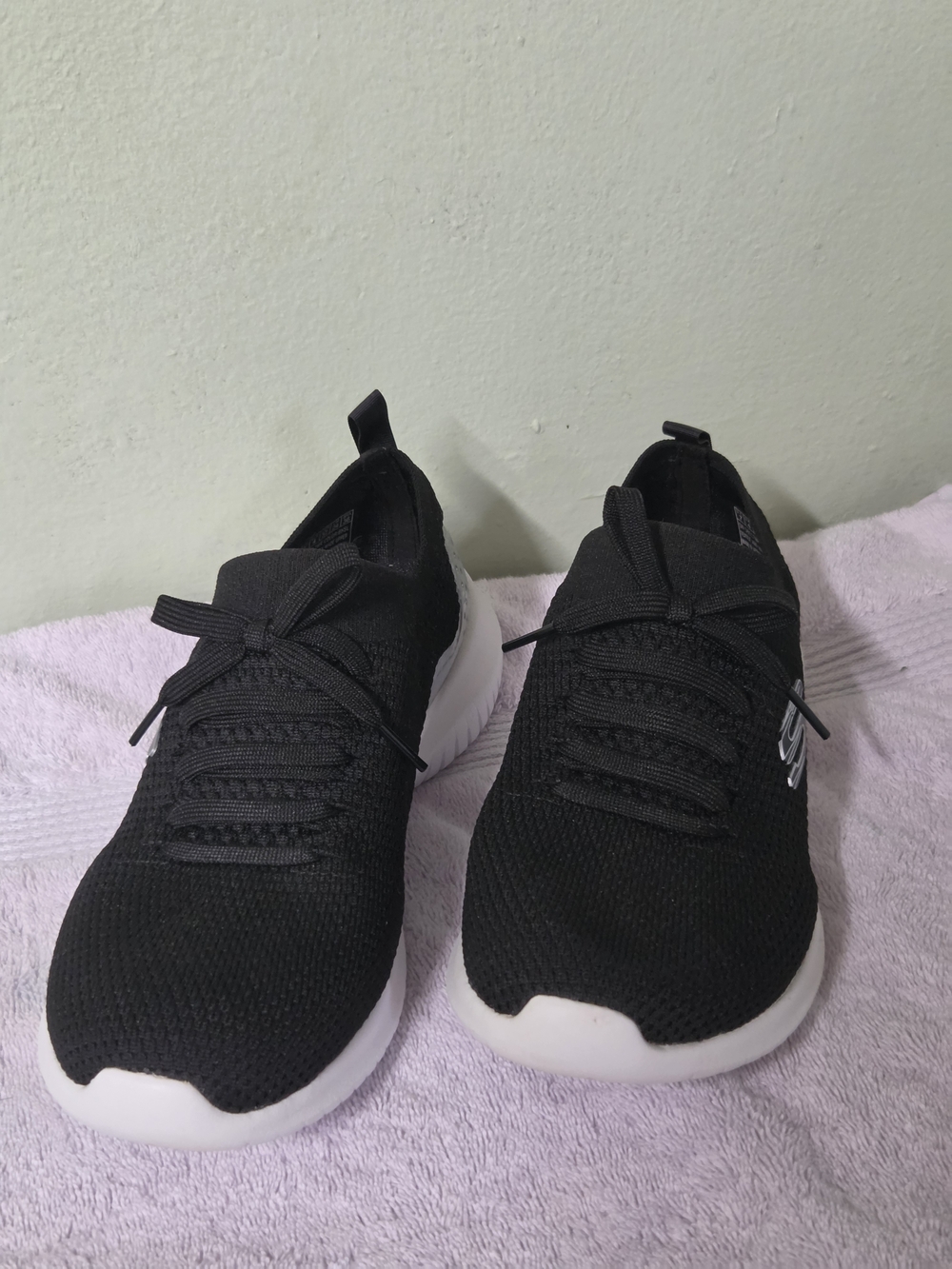 Skechers Black Knit Slip-On Athletic Sneakers with White Soles